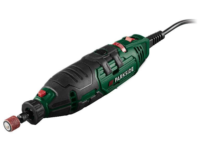 Grünes und schwarzes Rotationswerkzeug mit Schleifwalzenaufsatz und Netzkabel.