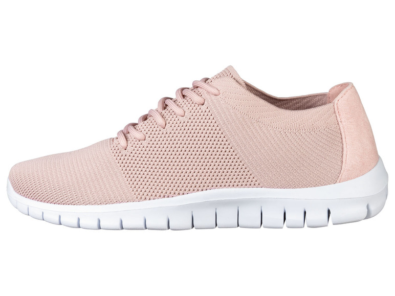 Rosa Sneaker mit weißer Sohle.