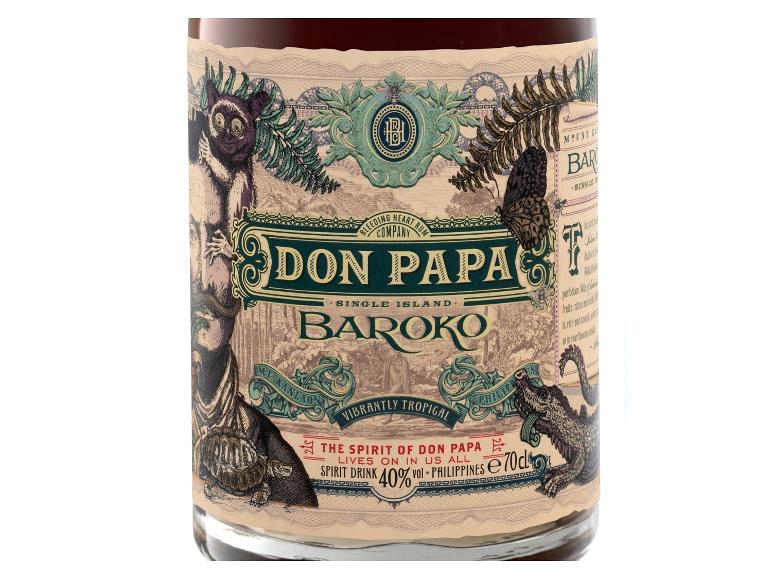 Don Papa Baroko Rumetikett mit tropischen Illustrationen und Tieren.