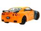 Ein orangefarbenes Nissan GT-R Modell-Auto von Jada Toys.