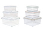 Zwei Sätze Glasbehälter mit Deckeln.