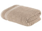 Ein gefaltetes Handtuch in Beige.