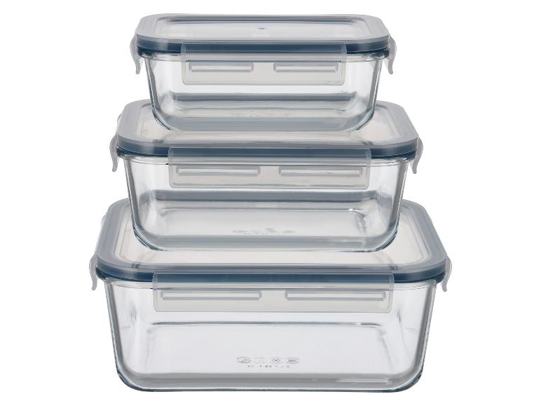 Set aus drei gestapelten Glasbehältern mit blauen Deckeln