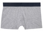 Graue Boxershorts mit dunkelblauem Bund.