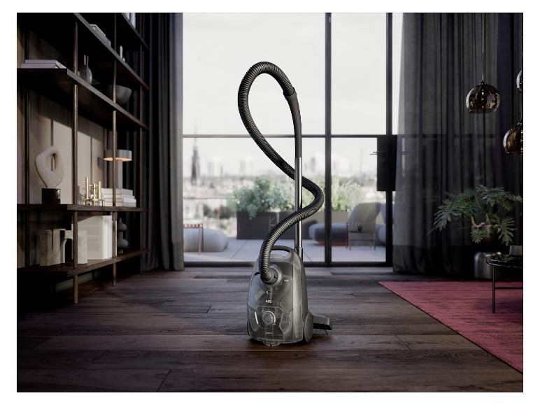 Staubsauger in einem modernen Wohnzimmer mit Holzboden und großen Fenstern.
