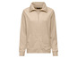 Beige Damenjacke mit Reißverschluss.
