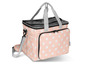 Eine rosa Kühltasche mit weißen Punkten und einem Tragegriff.