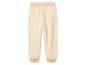 Beige Jogginghose mit elastischem Bund.