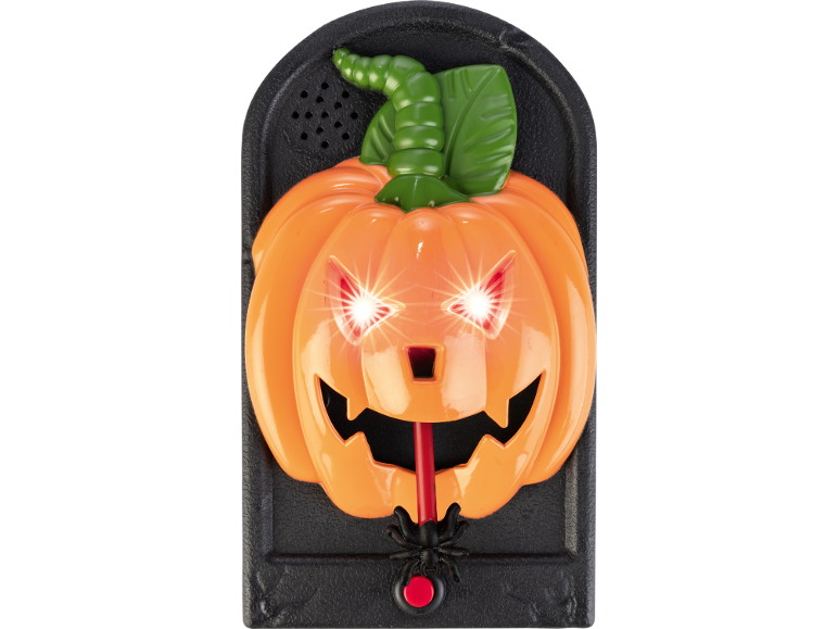 Halloween-Kürbis-Türklingel mit leuchtenden Augen, einer Spinne und einem roten Knopf.