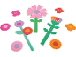 Bunte Papierblumen in verschiedenen Formen und Größen.