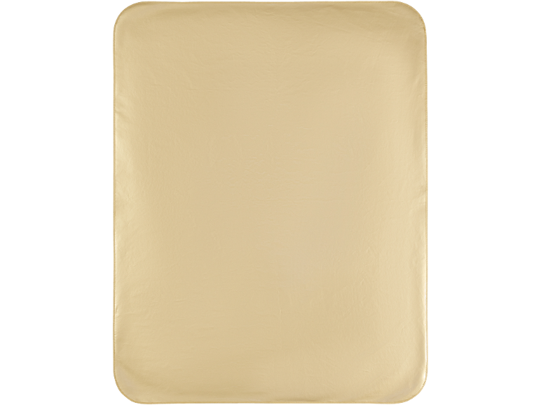 Eine hellbeige, rechteckige Decke mit abgerundeten Ecken.