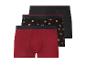 Dreierpack Herren-Boxershorts: rot, schwarz mit Brezeln und unifarben schwarz.