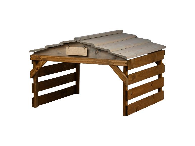 Holz-Tierunterstand mit grauem Dach und leerem Schild.