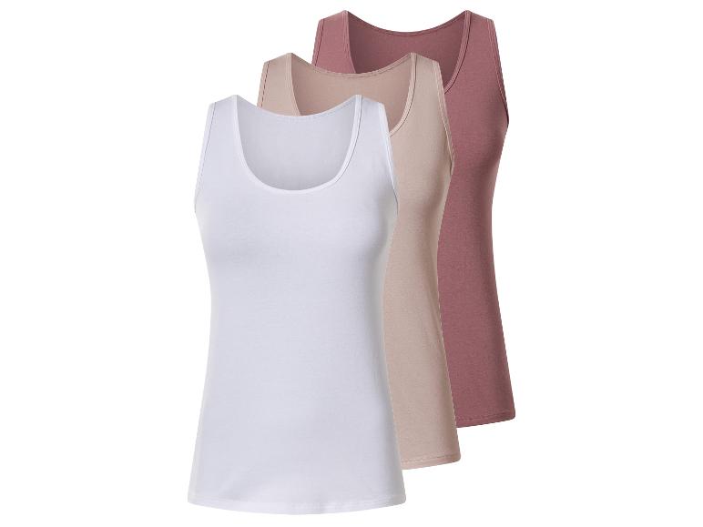 Drei Damen-Tanktops in Weiß, Beige und Rosa.