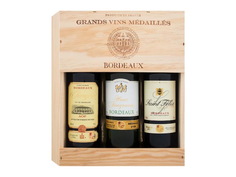 Eine Holzkiste mit drei Flaschen Bordeaux-Wein: Orangerie, Haut Pongraves und Saint Felix.