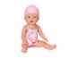 Babypuppe im rosa Flamingo-Badeanzug und rosa Badekappe.