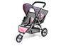 Ein rosa und grauer Kinderwagen mit Feen-Muster.