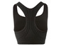 Ein schwarzer Sport-BH mit Racerback und Mesh-Details.