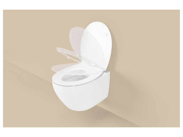 Wand-WC mit Absenkautomatik in Bewegung vor beigem Hintergrund.