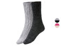 Zwei Paar weiche, gestrickte Socken in Grau und Schwarz.