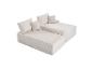 Zweiteiliges beiges Modulsofa mit Kissen, mit Cord-Textur.