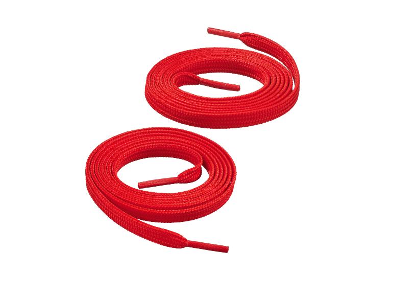 Zwei rote Schnürsenkel, zu Kreisen aufgerollt, auf weißem Hintergrund.