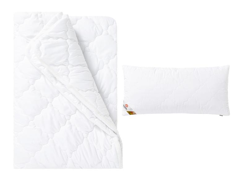 Weißes gestepptes Bettdecken- und Kissenset mit Polygiene-Etikett