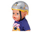 Baby Born Puppe mit Helm.
