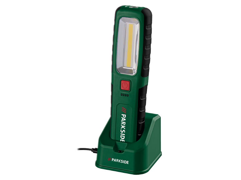 Wiederaufladbare LED-Arbeitsleuchte in einer Ladestation, grün und schwarz.