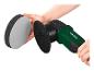 Eine grüne Parkside Poliermaschine mit zwei Polierpads