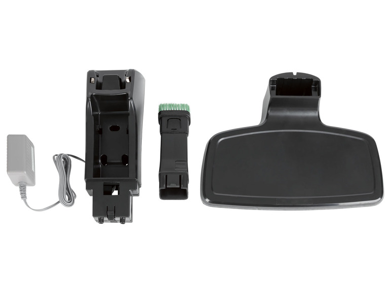 Ein Ladegerät, eine Halterung und eine Bürste für einen kabellosen Staubsauger.