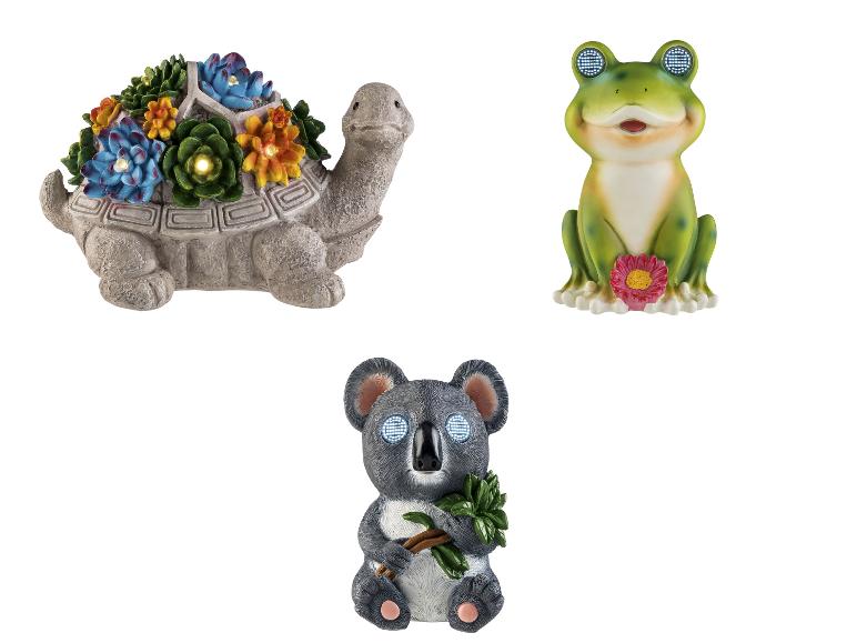 Solarbetriebene Gartendekorationen: Schildkröte mit Sukkulenten, Frosch und Koala mit leuchtenden Augen.