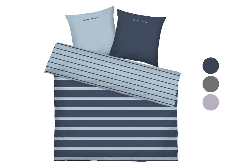 Tom Tailor gestreifte Bettwäschegarnitur mit zwei Kissen in Blau und Hellblau.