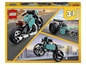 LEGO Creator 3-in-1-Set mit einem Motorrad, einem Dragster und einem weiteren Fahrzeug.