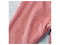Nahaufnahme von rosa Fleece-Stoff.