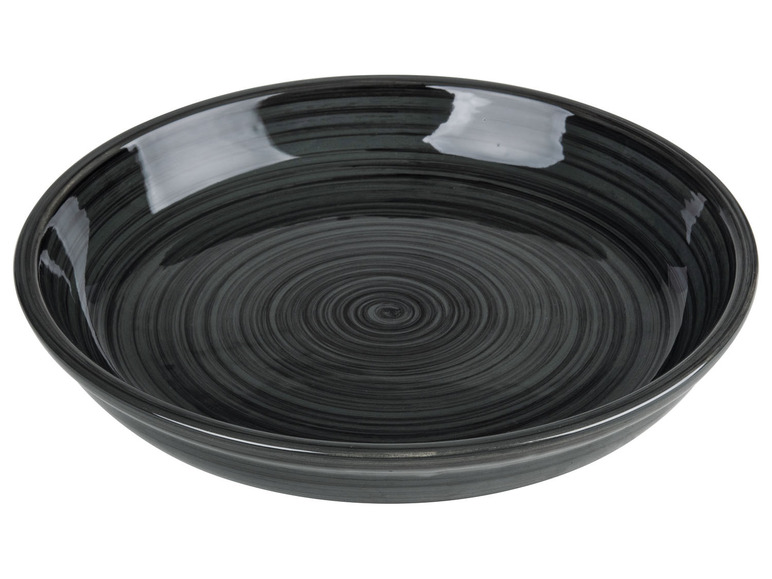 Eine schwarze, runde Schüssel mit Marmor-Design.