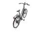 Schwarzes E-Bike mit Gepäckträger und Display am Lenker, Draufsicht.