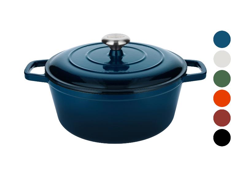 Blauer Gusseisentopf mit Deckel und Farbmustern