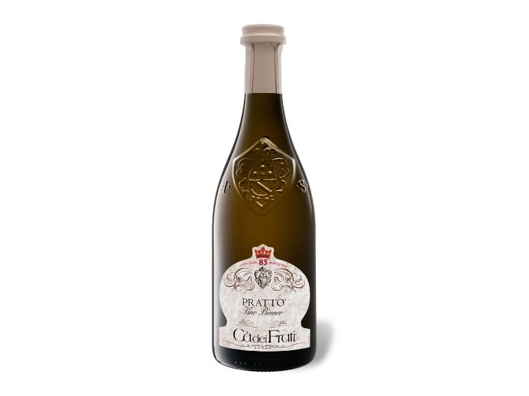 Flasche Weißwein mit dekorativem Etikett und goldenem Wappen, feiert 85 Jahre.