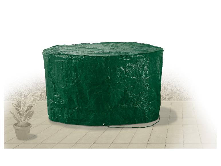 Grüne runde Schutzhülle für Gartenmöbel auf einer Terrasse.
