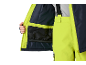Neon-gelbe Skijacke und Skihose mit Hosenträgern, schwarzes Innenfutter.