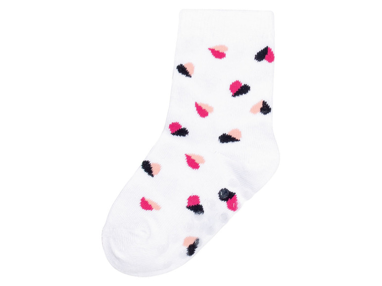 Weiße Socke mit rosa und schwarzen Punkten.