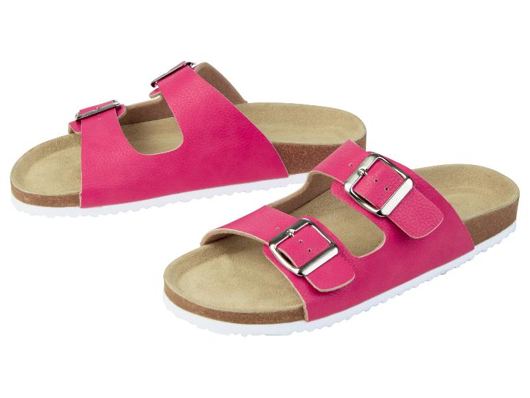 Rosa Sandalen mit doppelter Schnalle und Korksohle.
