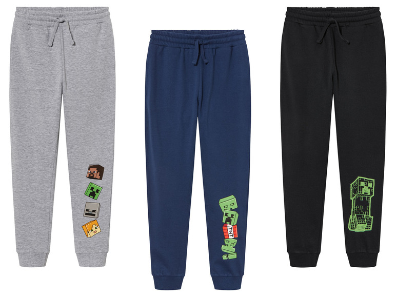 Drei Minecraft Jogginghosen in Grau, Blau und Schwarz.