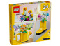 LEGO Creator 3-in-1-Set mit einer Gießkanne, einer Blume in einem Stiefel und einem Vogel.