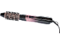 Rosa-schwarzer Warmluftstyler mit Bürstenkopf und Bedienelementen.