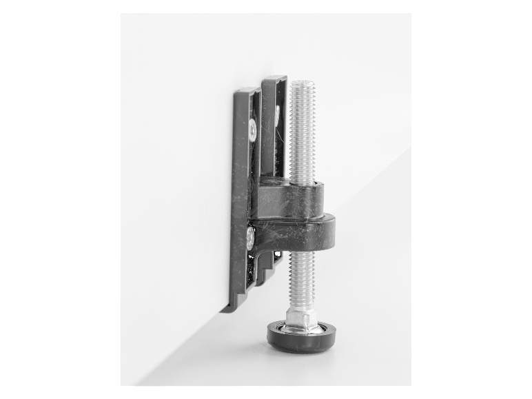 Ein verstellbarer Möbelfuß mit Schraube und Kunststoffbasis.