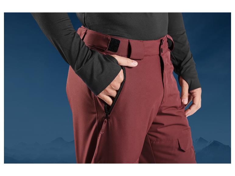 Rote Skihose mit Reißverschluss und Tasche.