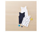 Drei Tanktops für Kinder: weiß, dunkelblau und weiß mit Sternen.