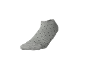 Graue Socke mit schwarzen Punkten.